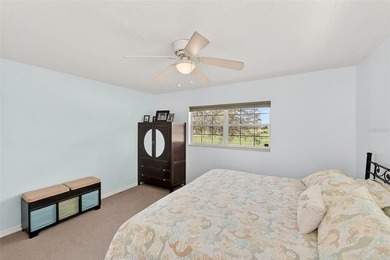 Wake up to sweeping golf course views in this bright, breezy on East Bay Golf Club in Florida - for sale on GolfHomes.com, golf home, golf lot