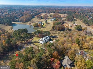 Discover this former golf fairway - now stunning 4.2-acre on Trophy Club of Atlanta in Georgia - for sale on GolfHomes.com, golf home, golf lot
