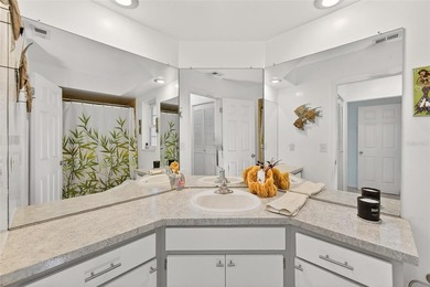 Wake up to sweeping golf course views in this bright, breezy on East Bay Golf Club in Florida - for sale on GolfHomes.com, golf home, golf lot