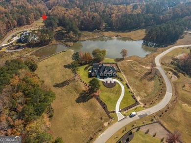 Discover this former golf fairway - now stunning 4.2-acre on Trophy Club of Atlanta in Georgia - for sale on GolfHomes.com, golf home, golf lot