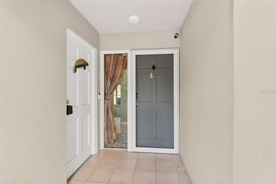 Wake up to sweeping golf course views in this bright, breezy on East Bay Golf Club in Florida - for sale on GolfHomes.com, golf home, golf lot