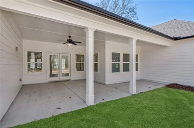 Nestled in the prestigious gated community of The Orchard in on The Orchard Golf and Country Club in Georgia - for sale on GolfHomes.com, golf home, golf lot