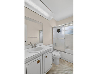 Lake & fountain views from both bedrooms & patio. Front patio & on Cypress Lakes Golf Course - West Palm Beach in Florida - for sale on GolfHomes.com, golf home, golf lot