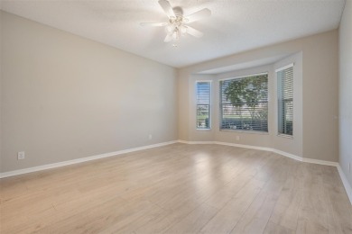 Water view and Golf course View! This freshly painted 2 Bedroom on Heritage Springs Country Club in Florida - for sale on GolfHomes.com, golf home, golf lot