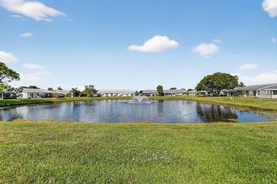 Lake & fountain views from both bedrooms & patio. Front patio & on Cypress Lakes Golf Course - West Palm Beach in Florida - for sale on GolfHomes.com, golf home, golf lot