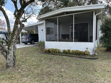 Neat as a pin and ready to move in! This two bedroom/two bath on Rolling Greens Executive Golf Community in Florida - for sale on GolfHomes.com, golf home, golf lot