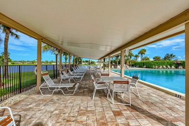 Lake & fountain views from both bedrooms & patio. Front patio & on Cypress Lakes Golf Course - West Palm Beach in Florida - for sale on GolfHomes.com, golf home, golf lot