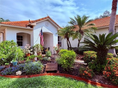 Beautifully maintained home in Solivita. Gorgeous landscaping on Stonegate Golf Club in Florida - for sale on GolfHomes.com, golf home, golf lot