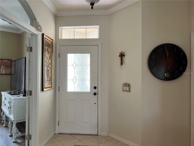 Beautifully maintained home in Solivita. Gorgeous landscaping on Stonegate Golf Club in Florida - for sale on GolfHomes.com, golf home, golf lot