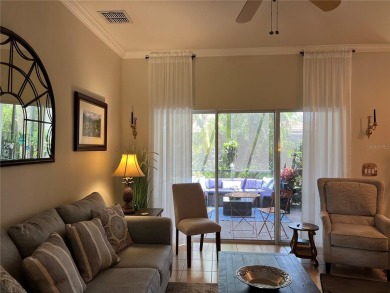 Beautifully maintained home in Solivita. Gorgeous landscaping on Stonegate Golf Club in Florida - for sale on GolfHomes.com, golf home, golf lot