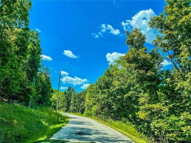 Build your Ozark dream on this beautiful 0.29-acre lot on on Holiday Island Golf Course in Arkansas - for sale on GolfHomes.com, golf home, golf lot