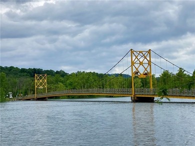 Build your Ozark dream on this beautiful 0.29-acre lot on on Holiday Island Golf Course in Arkansas - for sale on GolfHomes.com, golf home, golf lot