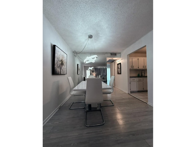 Step into this totally renovated 1-bedroom, 1-bathroom condo and on Flamingo Lakes Country Club in Florida - for sale on GolfHomes.com, golf home, golf lot