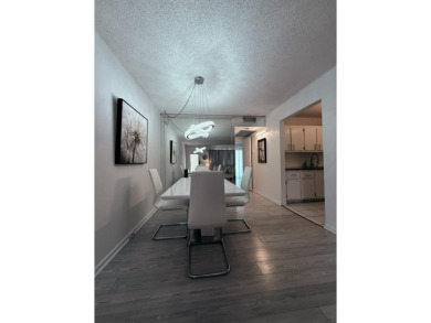 Step into this totally renovated 1-bedroom, 1-bathroom condo and on Flamingo Lakes Country Club in Florida - for sale on GolfHomes.com, golf home, golf lot