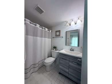 Step into this totally renovated 1-bedroom, 1-bathroom condo and on Flamingo Lakes Country Club in Florida - for sale on GolfHomes.com, golf home, golf lot