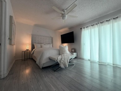 Step into this totally renovated 1-bedroom, 1-bathroom condo and on Flamingo Lakes Country Club in Florida - for sale on GolfHomes.com, golf home, golf lot