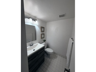 Step into this totally renovated 1-bedroom, 1-bathroom condo and on Flamingo Lakes Country Club in Florida - for sale on GolfHomes.com, golf home, golf lot