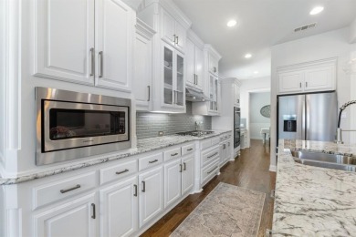 Welcome to your dream home nestled in the highly sought-after on The Tribute At the Colony in Texas - for sale on GolfHomes.com, golf home, golf lot