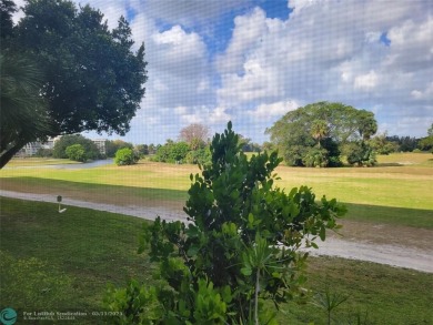 ***Lovely and cozy 2nd Floor unit overlooking serene views of on Palm-Aire Country Club and Resort - Palms in Florida - for sale on GolfHomes.com, golf home, golf lot