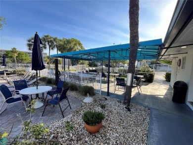 ***Lovely and cozy 2nd Floor unit overlooking serene views of on Palm-Aire Country Club and Resort - Palms in Florida - for sale on GolfHomes.com, golf home, golf lot