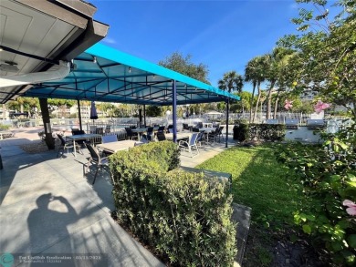 ***Lovely and cozy 2nd Floor unit overlooking serene views of on Palm-Aire Country Club and Resort - Palms in Florida - for sale on GolfHomes.com, golf home, golf lot