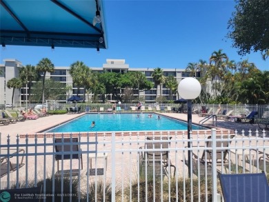 ***Lovely and cozy 2nd Floor unit overlooking serene views of on Palm-Aire Country Club and Resort - Palms in Florida - for sale on GolfHomes.com, golf home, golf lot