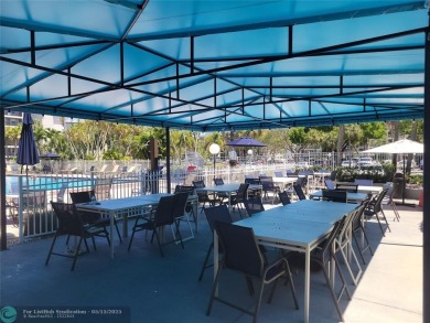 ***Lovely and cozy 2nd Floor unit overlooking serene views of on Palm-Aire Country Club and Resort - Palms in Florida - for sale on GolfHomes.com, golf home, golf lot