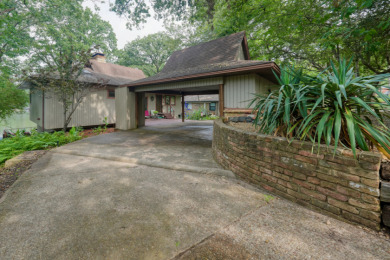 Tranquil waterfront setting on Hide-A-Way Lake Golf Course in Texas - for sale on GolfHomes.com, golf home, golf lot