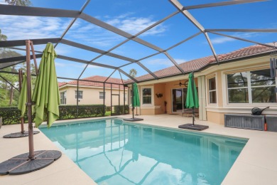 BREATHTAKING GOLF & WATER VIEWS! Experience refined living in on The Legacy Golf and Tennis Club in Florida - for sale on GolfHomes.com, golf home, golf lot