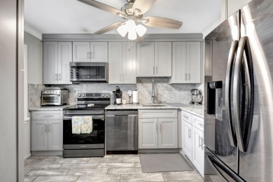 This beautiful 2nd floor corner unit in Fairways Green, Boca on Boca Lago Golf and Country Club in Florida - for sale on GolfHomes.com, golf home, golf lot