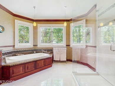 Serenity and beauty will greet you as you enter this stunning on Bull Valley Golf Club in Illinois - for sale on GolfHomes.com, golf home, golf lot