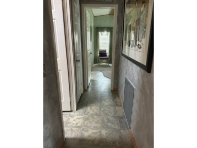 Step into this exceptional, FULLY FURNISHED (TURN KEY) 2-bedroom on Schalamar Creek Golf and Country Club in Florida - for sale on GolfHomes.com, golf home, golf lot
