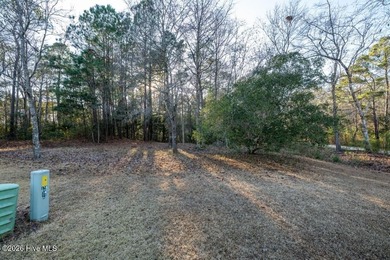 Located at the end of a quiet cul-de-sac, this approximately on Rivers Edge Golf Club in North Carolina - for sale on GolfHomes.com, golf home, golf lot