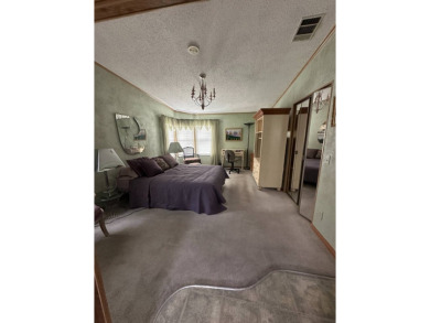Step into this exceptional, FULLY FURNISHED (TURN KEY) 2-bedroom on Schalamar Creek Golf and Country Club in Florida - for sale on GolfHomes.com, golf home, golf lot