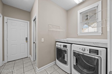 This custom-built brick home has been exceptionally cared for on Brunswick Plantation and Golf Resorts in North Carolina - for sale on GolfHomes.com, golf home, golf lot