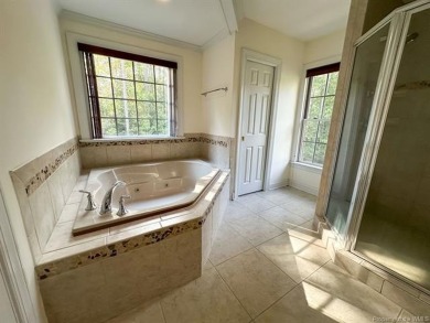Step into timeless elegance with this one-owner, custom-built on Brickshire Golf Club in Virginia - for sale on GolfHomes.com, golf home, golf lot