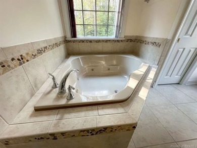 Step into timeless elegance with this one-owner, custom-built on Brickshire Golf Club in Virginia - for sale on GolfHomes.com, golf home, golf lot