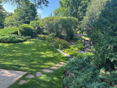 Serenity and beauty will greet you as you enter this stunning on Bull Valley Golf Club in Illinois - for sale on GolfHomes.com, golf home, golf lot