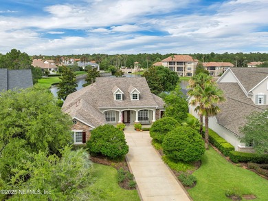 This elegant David Weekley home offers panoramic water views on The Palencia Club in Florida - for sale on GolfHomes.com, golf home, golf lot