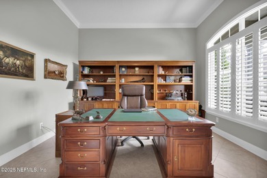 This elegant David Weekley home offers panoramic water views on The Palencia Club in Florida - for sale on GolfHomes.com, golf home, golf lot