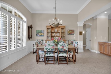 This elegant David Weekley home offers panoramic water views on The Palencia Club in Florida - for sale on GolfHomes.com, golf home, golf lot