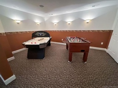Step into timeless elegance with this one-owner, custom-built on Brickshire Golf Club in Virginia - for sale on GolfHomes.com, golf home, golf lot