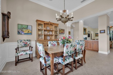 This elegant David Weekley home offers panoramic water views on The Palencia Club in Florida - for sale on GolfHomes.com, golf home, golf lot