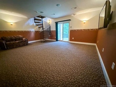 Step into timeless elegance with this one-owner, custom-built on Brickshire Golf Club in Virginia - for sale on GolfHomes.com, golf home, golf lot