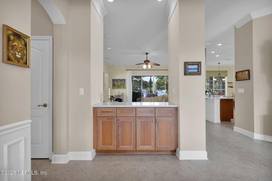 This elegant David Weekley home offers panoramic water views on The Palencia Club in Florida - for sale on GolfHomes.com, golf home, golf lot