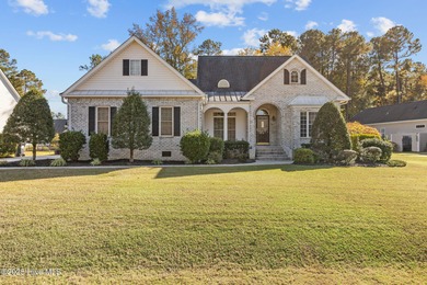 This custom-built brick home has been exceptionally cared for on Brunswick Plantation and Golf Resorts in North Carolina - for sale on GolfHomes.com, golf home, golf lot