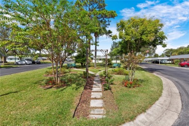 Gated ACTIVE 55+ PET friendly community Paradise Pointe in on Summertree Golf Course in Florida - for sale on GolfHomes.com, golf home, golf lot