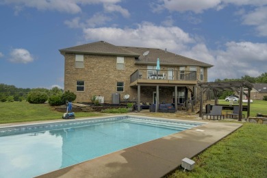 Spectacular all brick & stone home setting on 5.1 acres near on Honey Creek Golf Club in Missouri - for sale on GolfHomes.com, golf home, golf lot