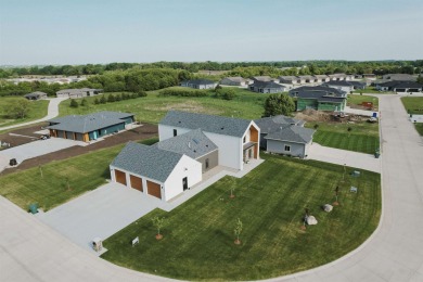 Get ready to be impressed!! This 2022 build with 5 bedrooms, 1 on Emerald Hills Golf Club in Iowa - for sale on GolfHomes.com, golf home, golf lot