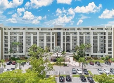 This spacious 2-bedroom condo features laminate wood flooring on Inverrary Country Club in Florida - for sale on GolfHomes.com, golf home, golf lot